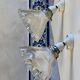 Holophane wall lights with bistro-style porcelain supports