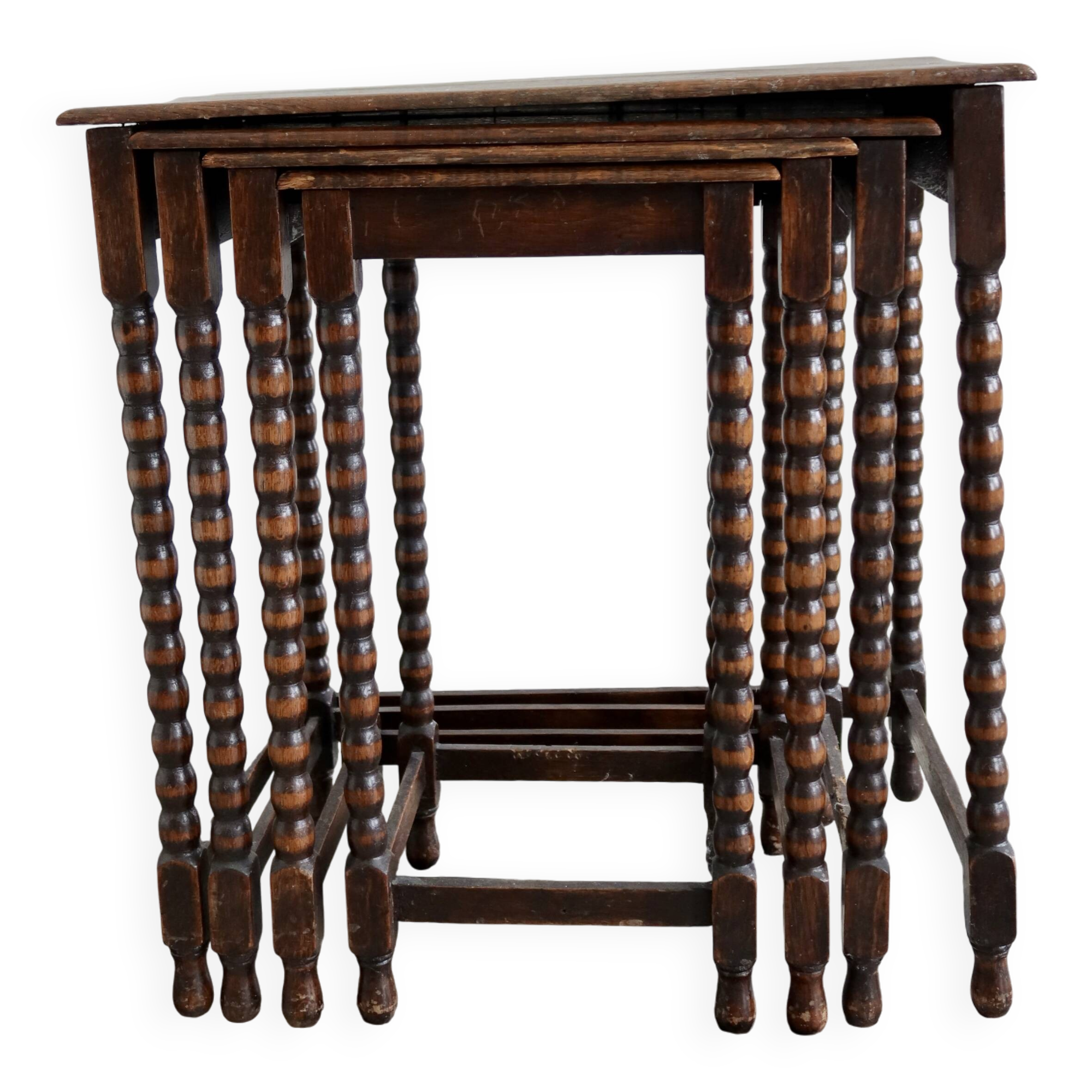 4 antique nesting tables made of turned wood