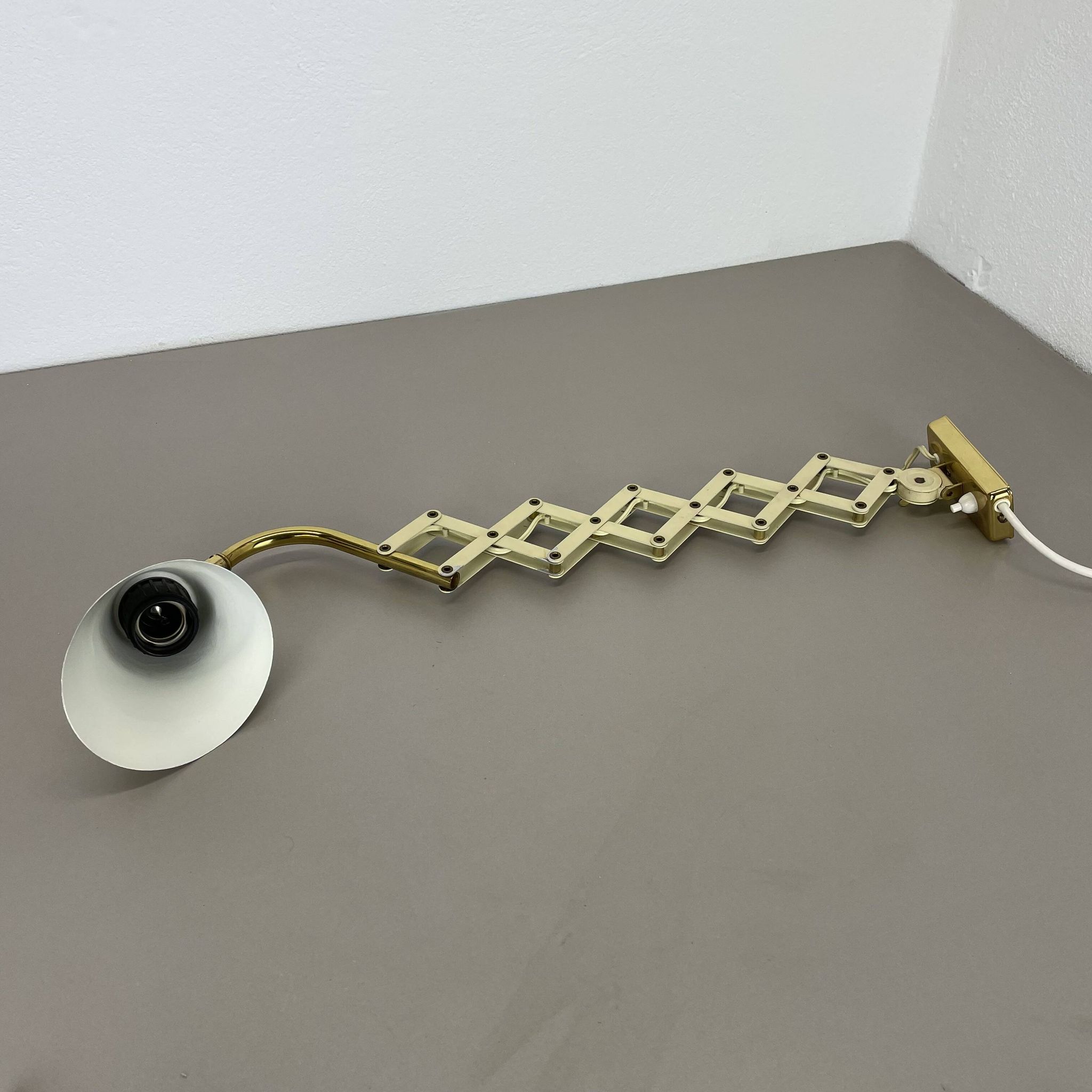 Original brass and metal scissors wall light by SIS Leuchten, Germany, 1950s.