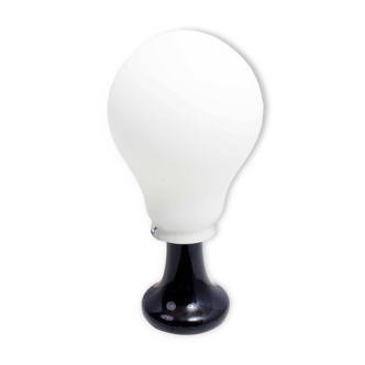 Designer lamp in the shape of a bulb