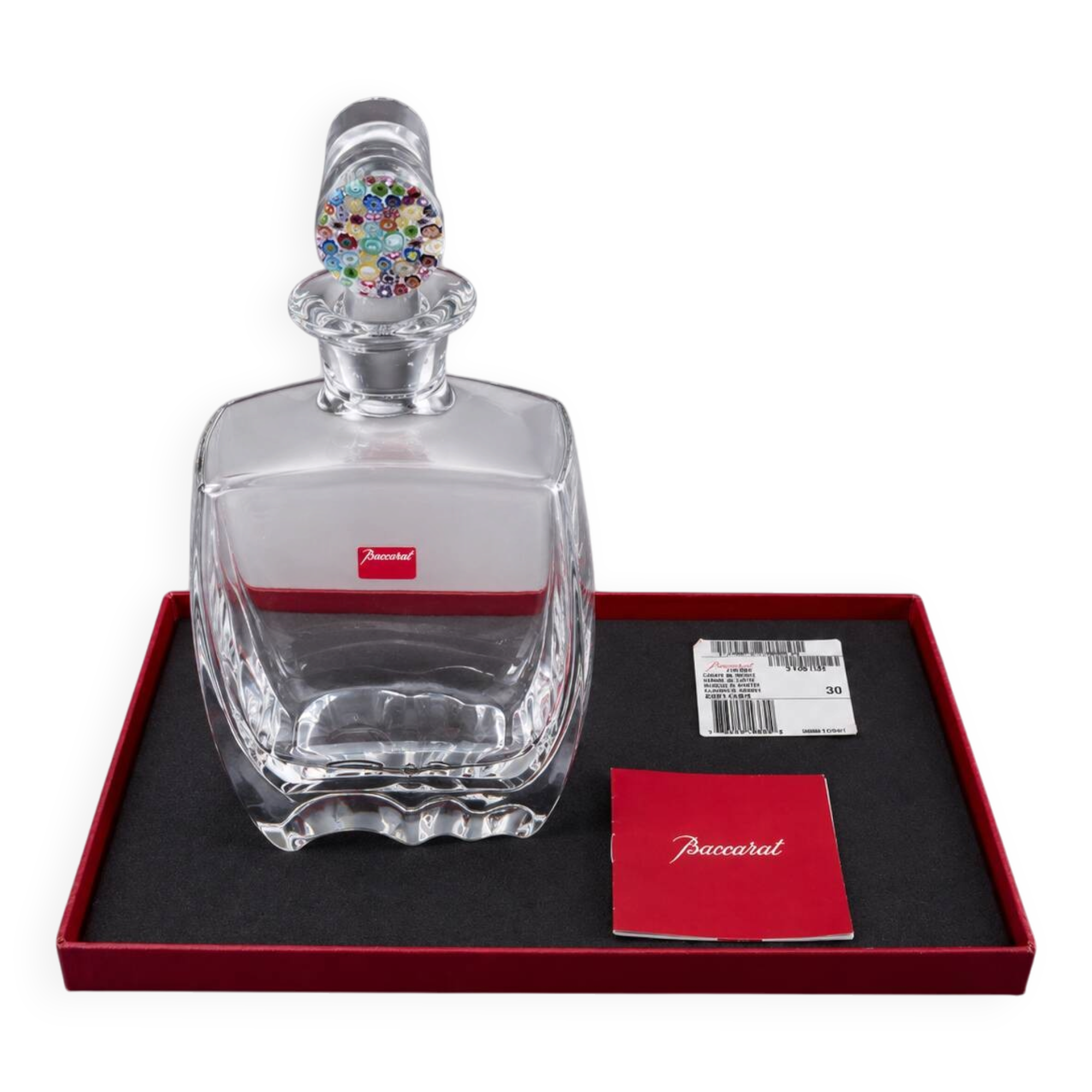 Baccarat crystal carafe with millefiori stopper and original box.