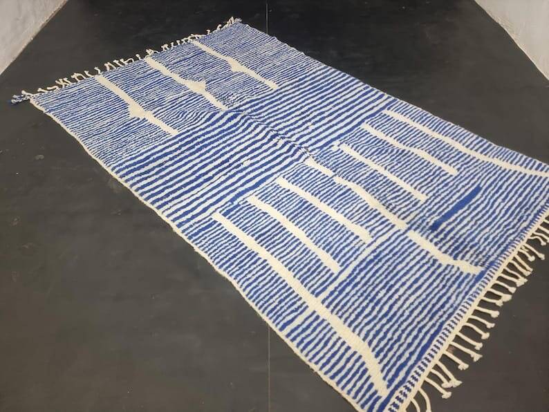 Handwoven Berber rug in blue and white, size 150x250 cm.