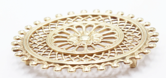 Vintage brass rosette underside