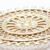 Vintage brass rosette underside