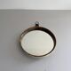 Round wall mirror with brass frame and leather hanger, 1960, Germany
