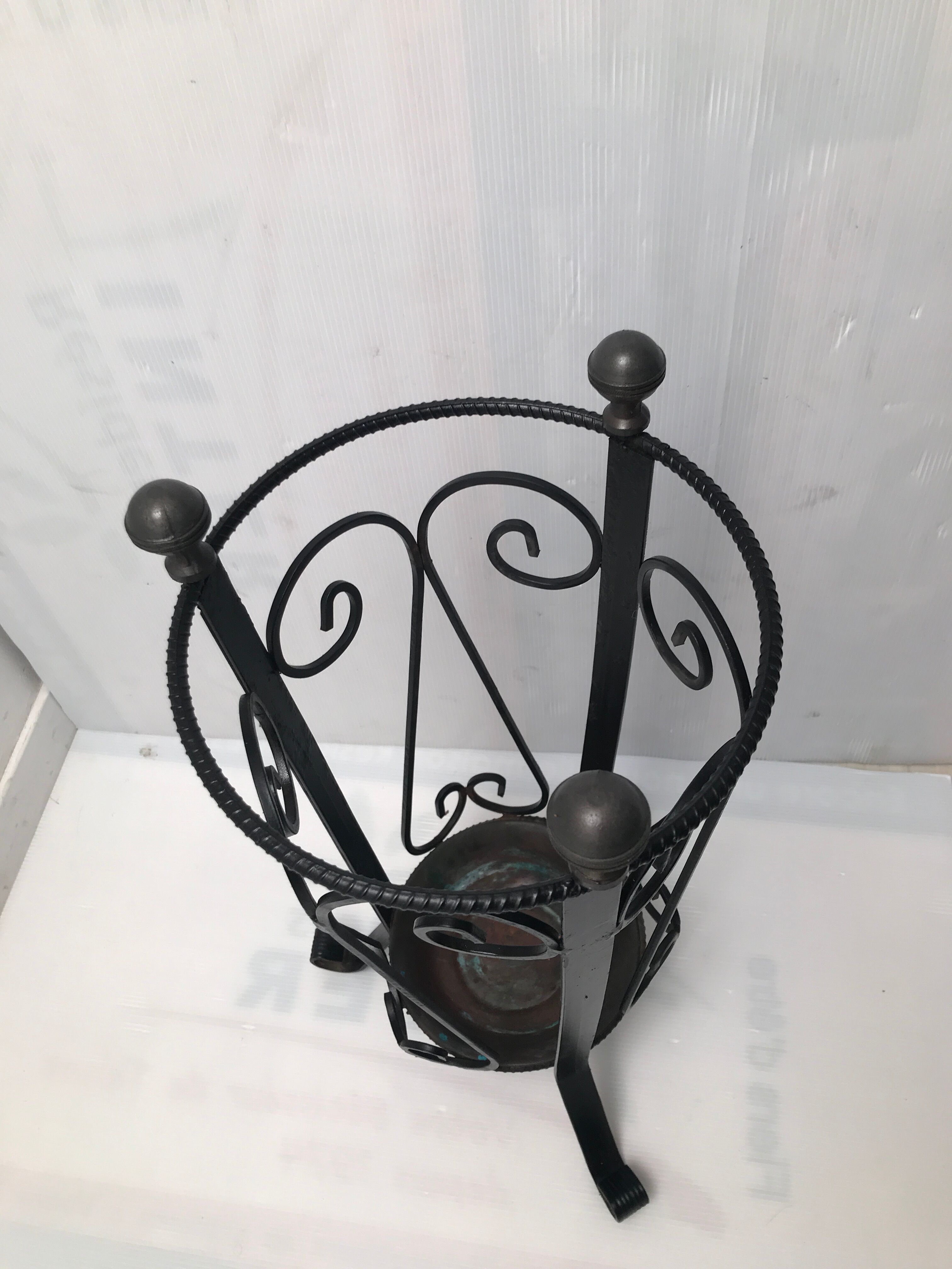 Wrought iron umbrella holder