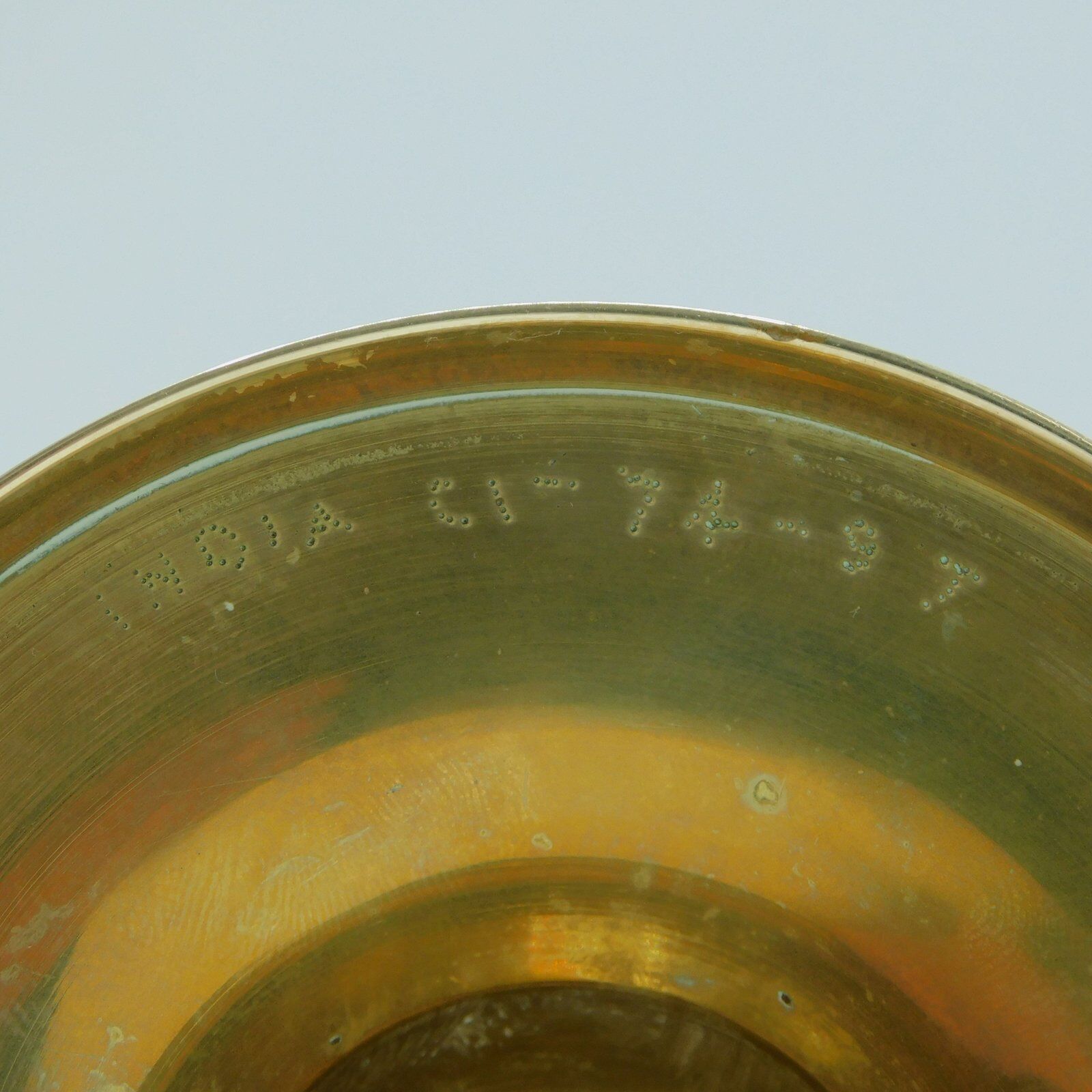 Engraved brass candlestick