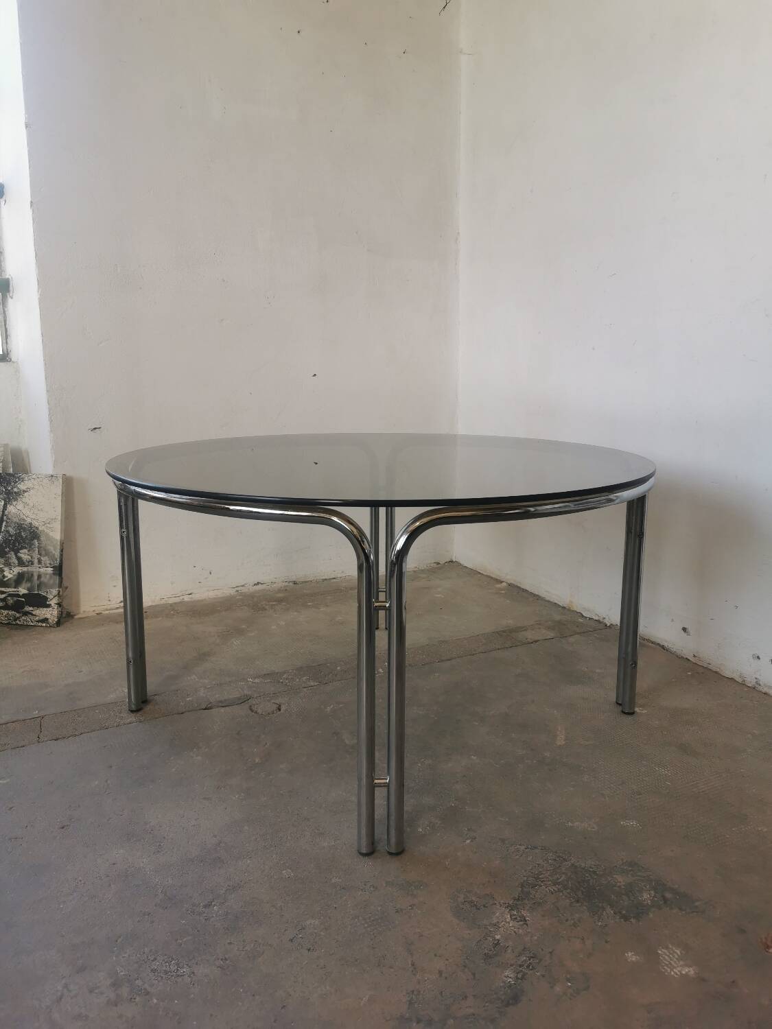 Round chrome and smoked glass coffee table