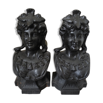 Pair of antique cast iron "air" antique fireplace andirons