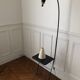 Tablet floor lamp and magazine holder with diabolo