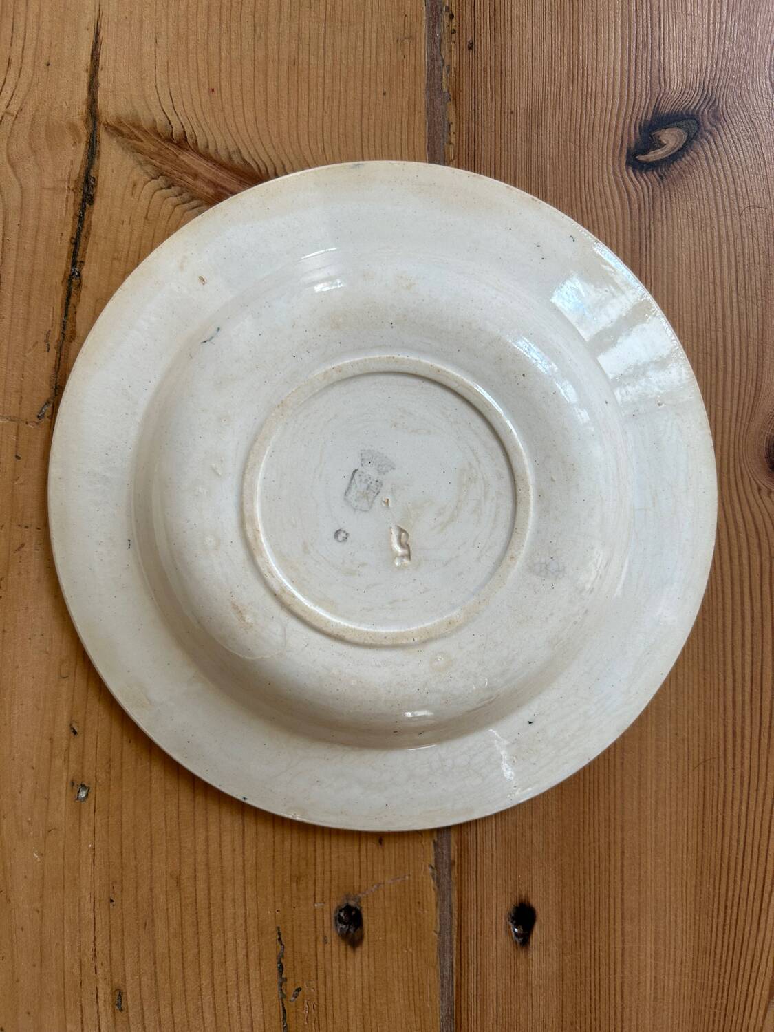 Series of 4 mismatched soup plates “Terre de Fer”