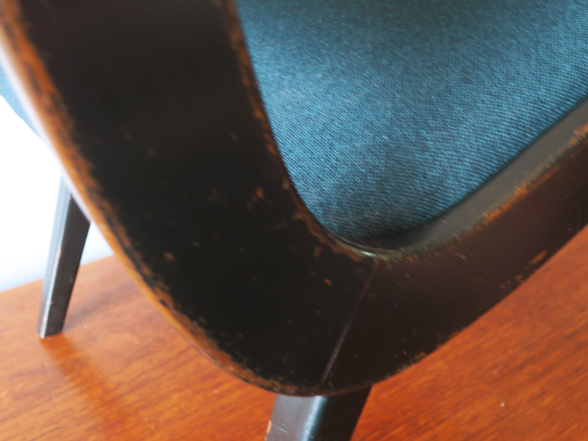 Jens Risom armless chair with ebonized frame and petrol blue-green covers