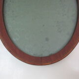 Oval wall frame in wood marquetry