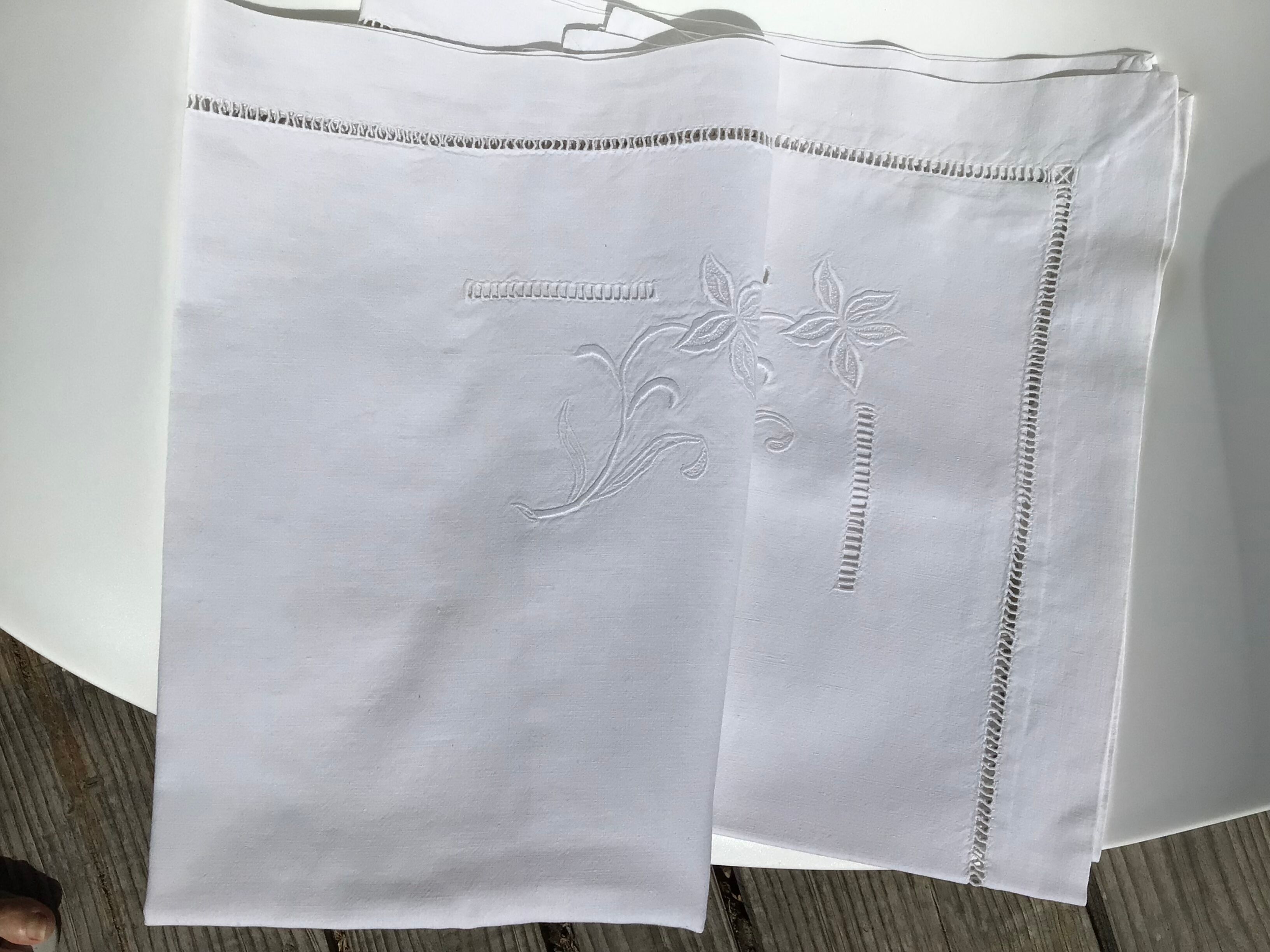 Pair of square pillowcases embroidered flower day ladder