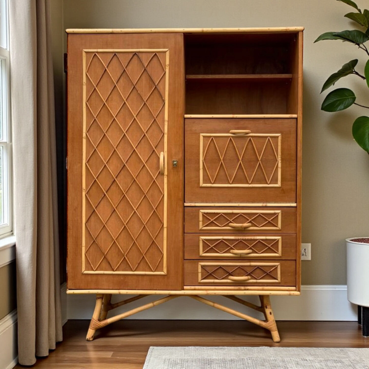 Rattan wardrobe with tapered legs from the 1960s.