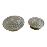Pair of large and small round sconces in cut glass with ceramic support for the bulb