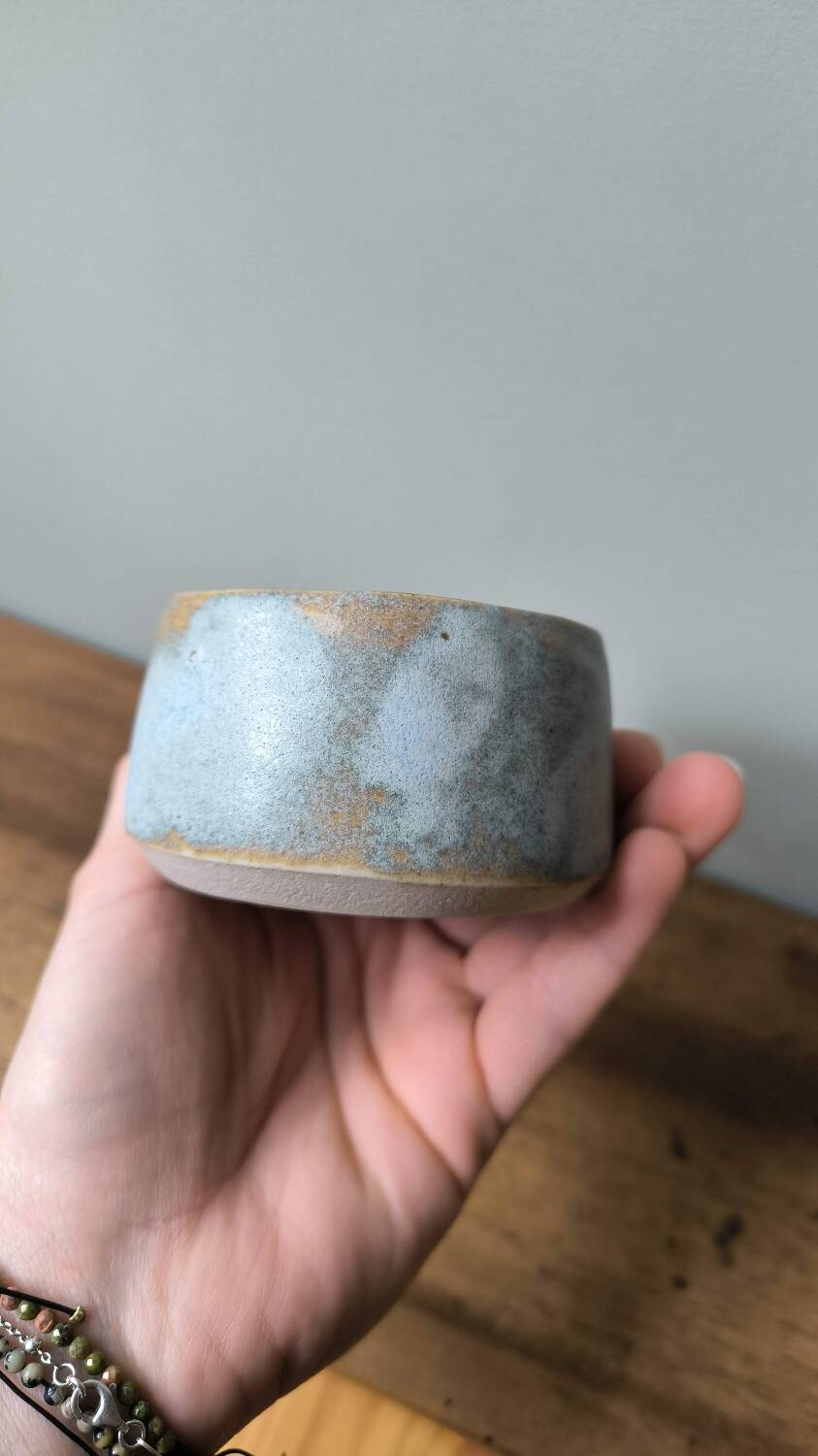 Handmade ceramic stoneware mug with blue enamel