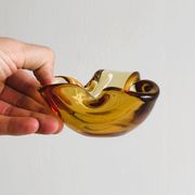 Thick amber yellow glass ashtray