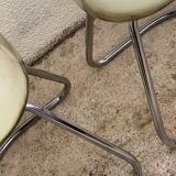 Pair of 70's smoked plexiglass and chrome chairs