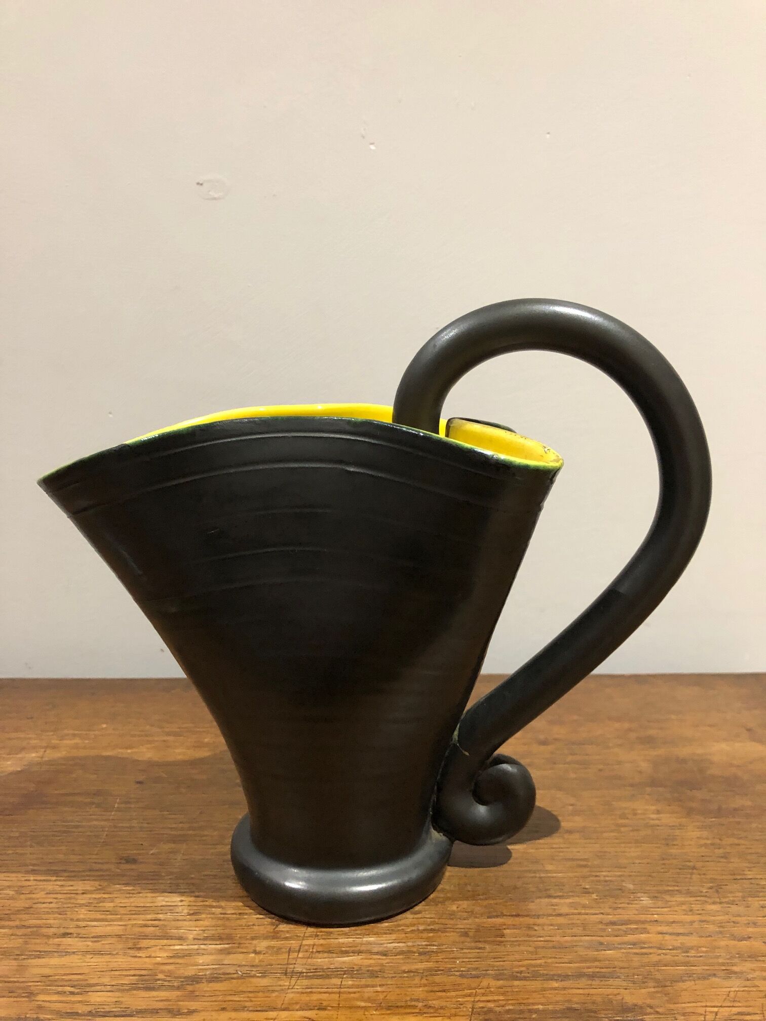 black and yellow vallauris pitcher