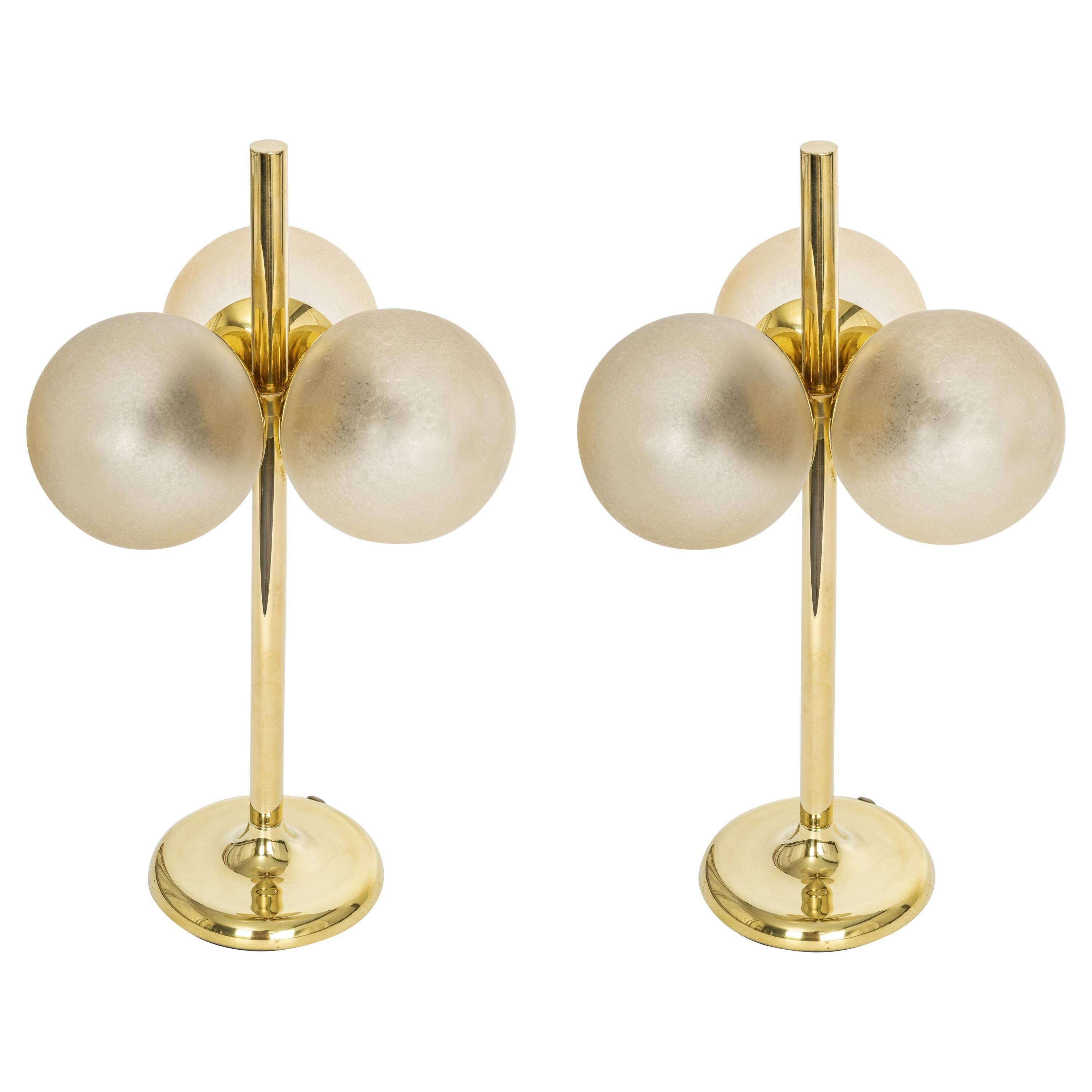 Pair of large brass table lamps by Kaiser, Germany, 1970s.