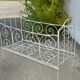 Old white wrought iron child bed