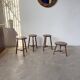 Set of 4 turned oak stools.