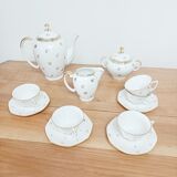 Coffee set in white and gold porcelain