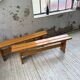 Paire de bancs en pin Charlotte Perriand Les arcs