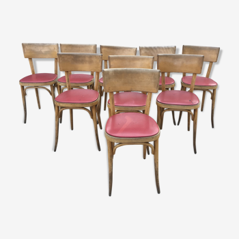 Suite de 9 chaises bistrot « Baumann » skaï rouge