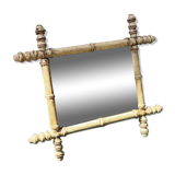 Old mirror in raw wood