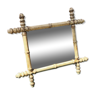 Old mirror in raw wood