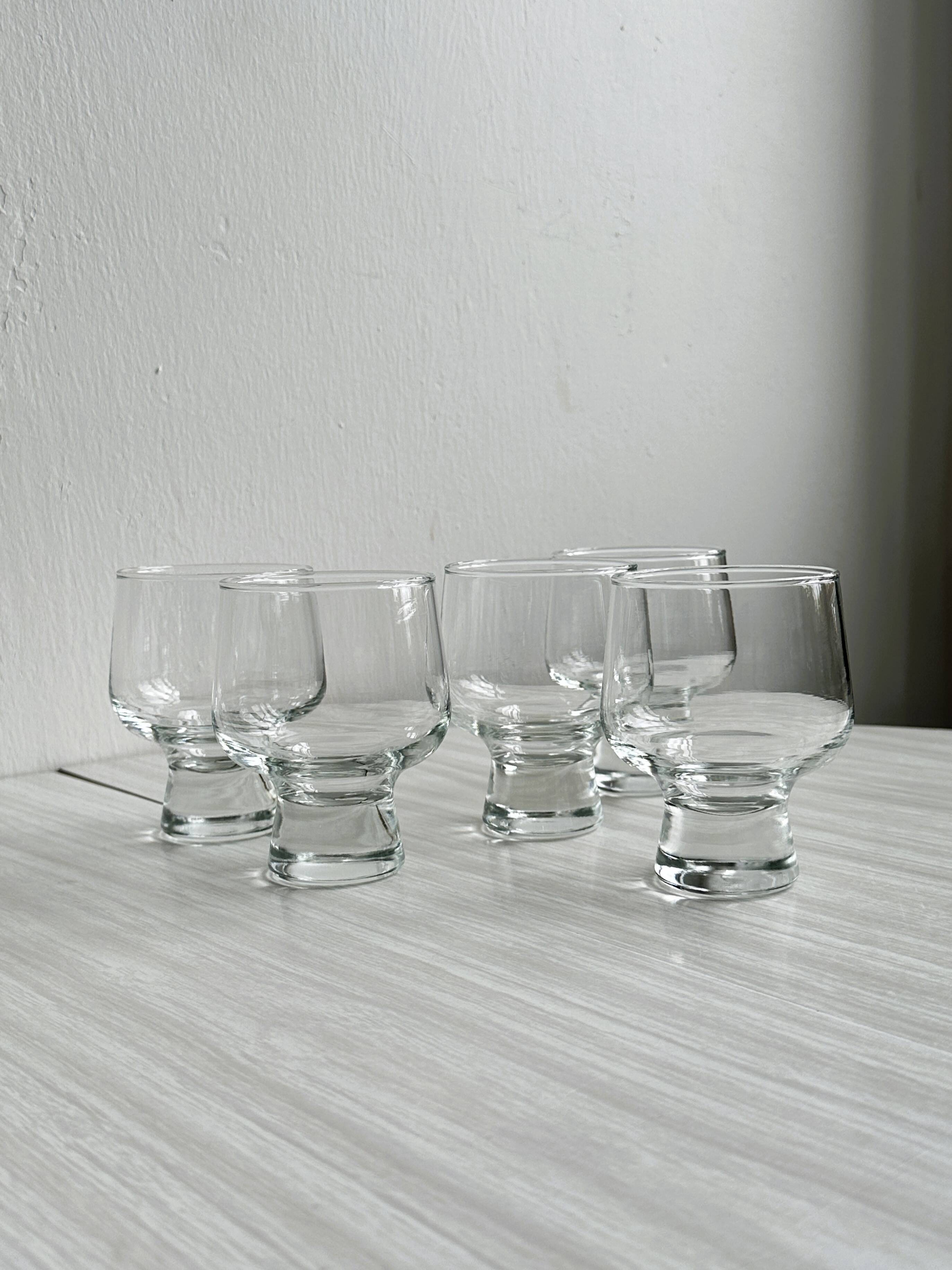 5 thick glass water glasses.