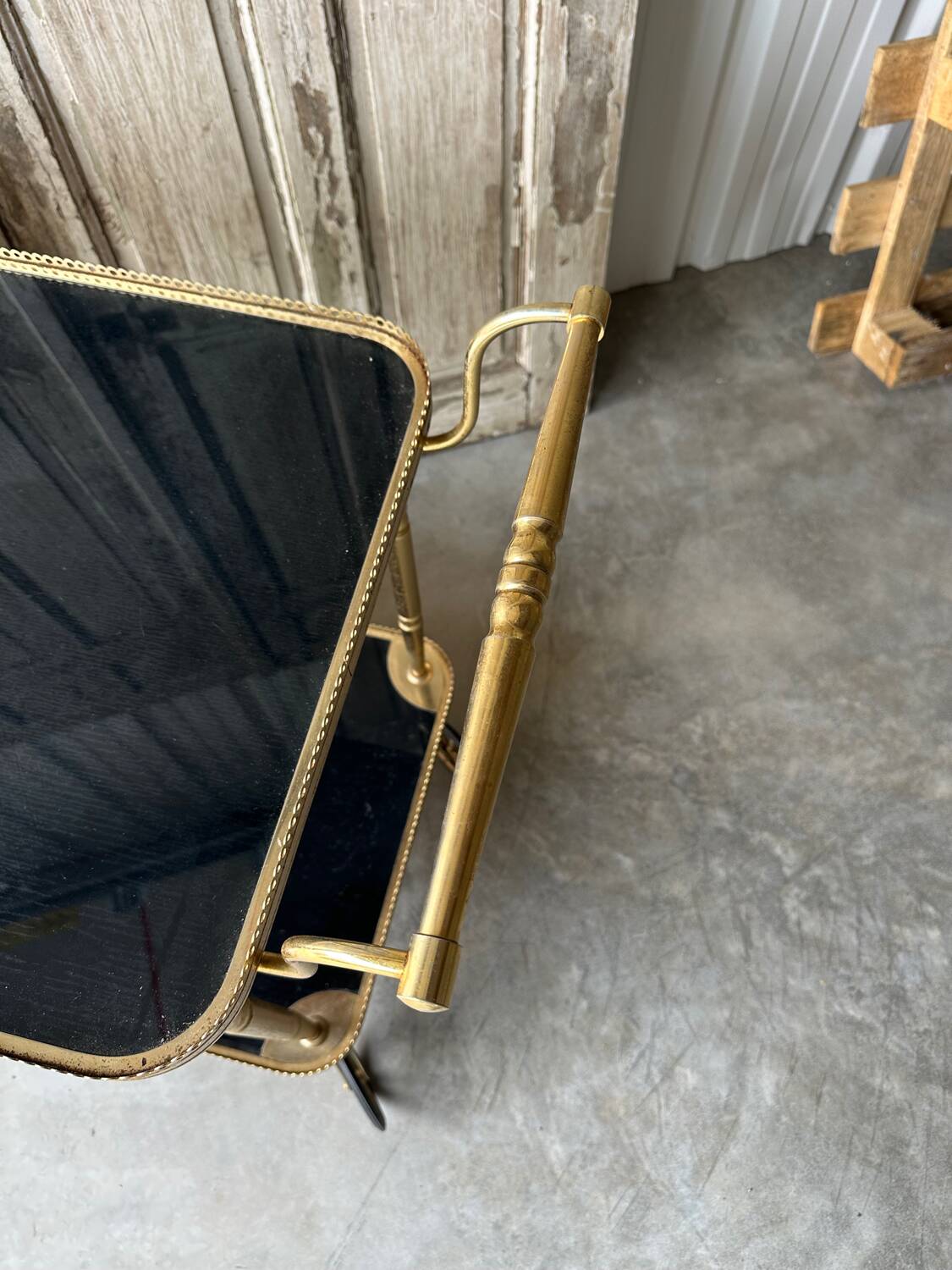 Vintage black and gold rolling trolley