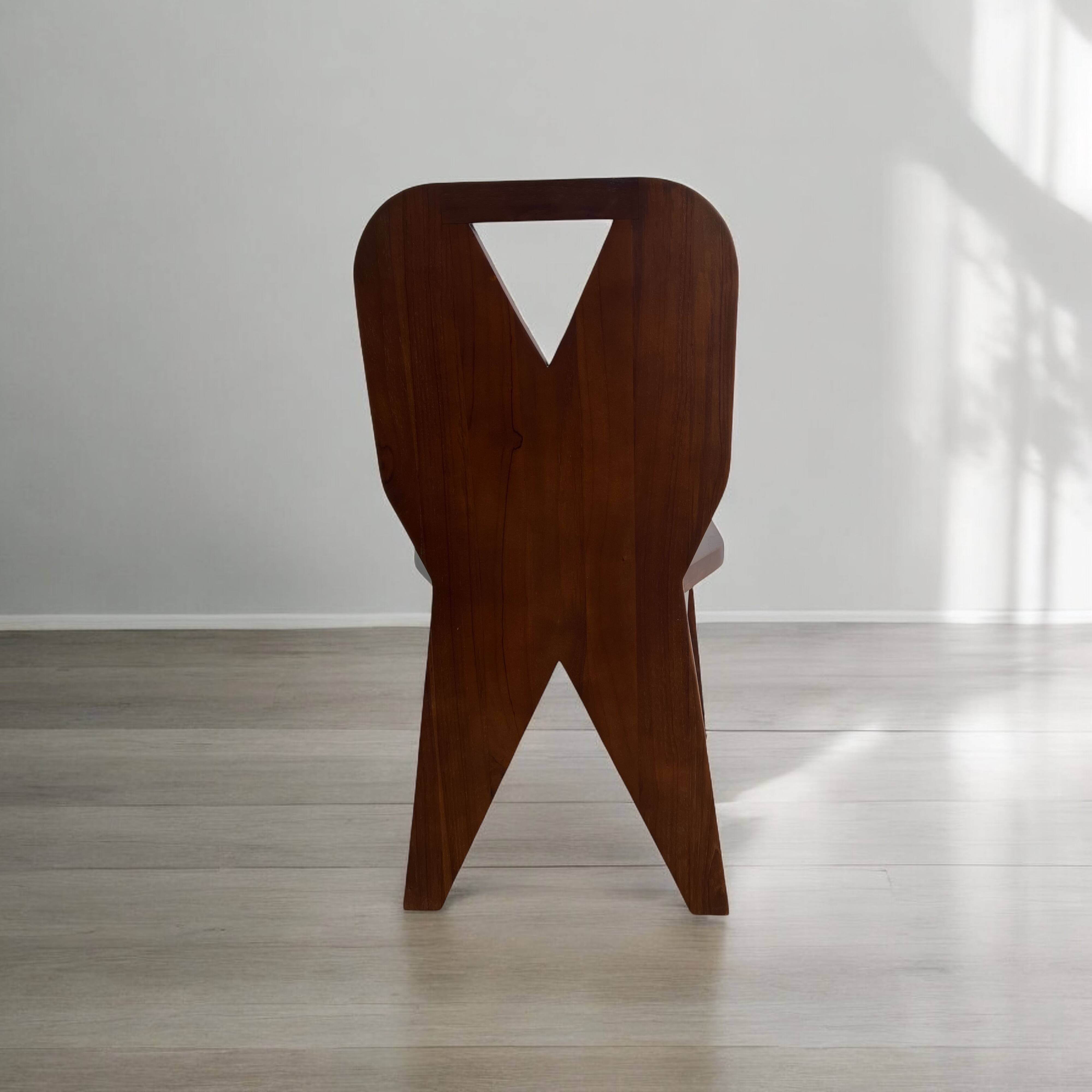 Retro brutalist chair in dark solid wood