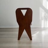 Retro brutalist chair in dark solid wood