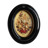 Oval frame dried flower