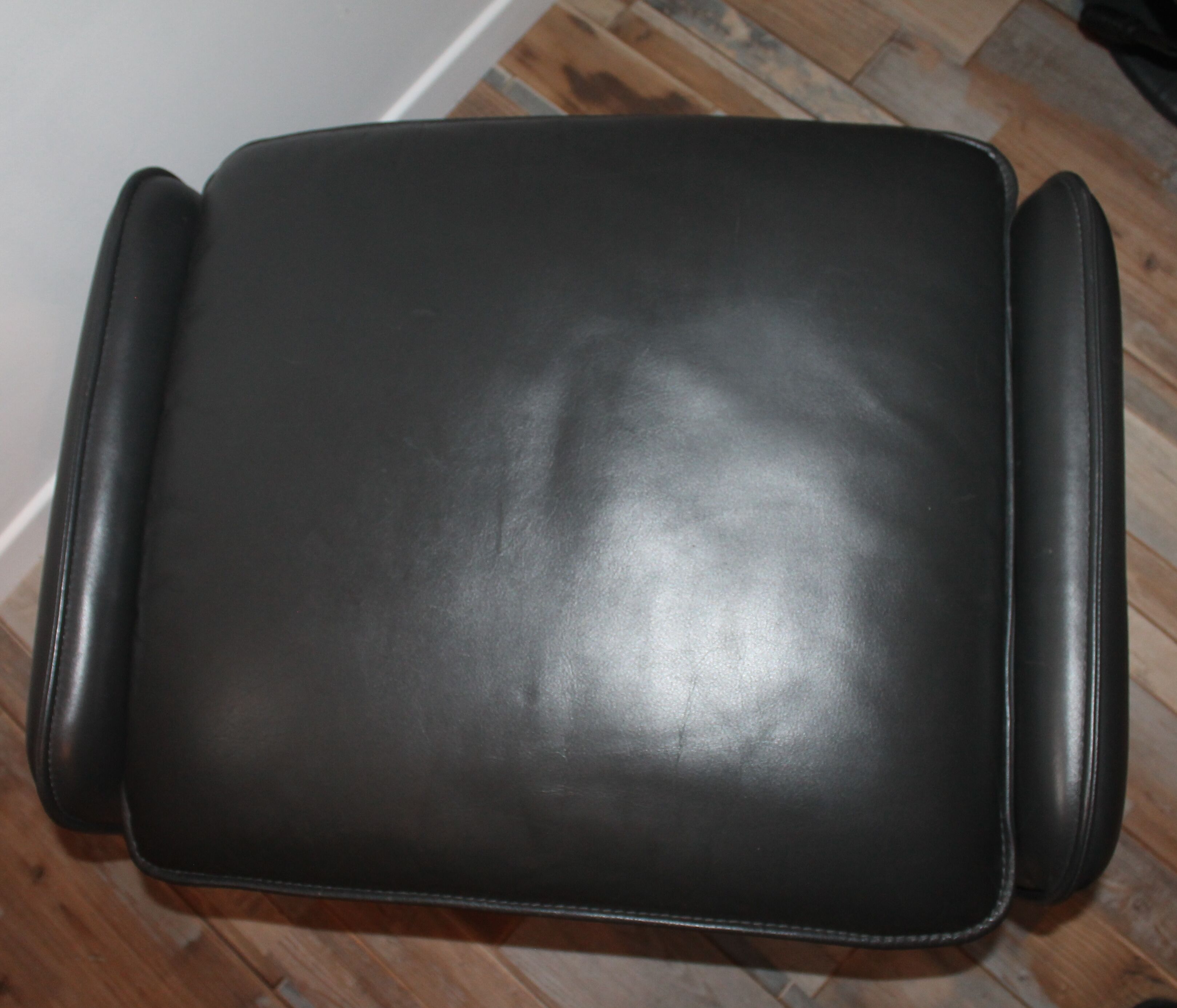 Fauteuil et ottoman cuir Leolux par Axel van Enthoven