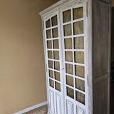 Antique library patinated in whitewashed white