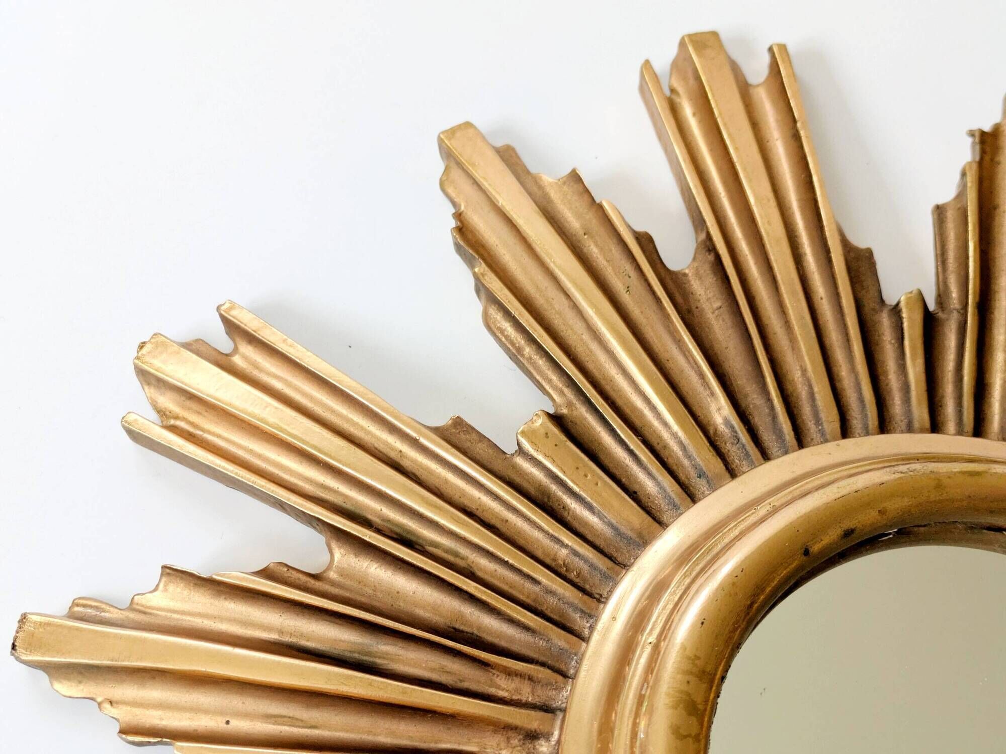 Vintage sunburst mirror in wood and gold resin, 1960s–70s