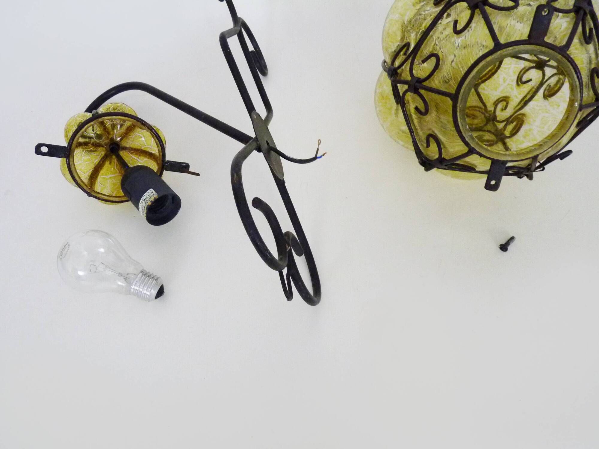 Vintage Italian wall light in transparent yellow blown glass and wrought iron. 70s 80s