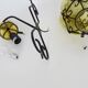 Vintage Italian wall light in transparent yellow blown glass and wrought iron. 70s 80s