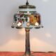 Vintage lamp in brass and ceramic. Flowering tree of life.