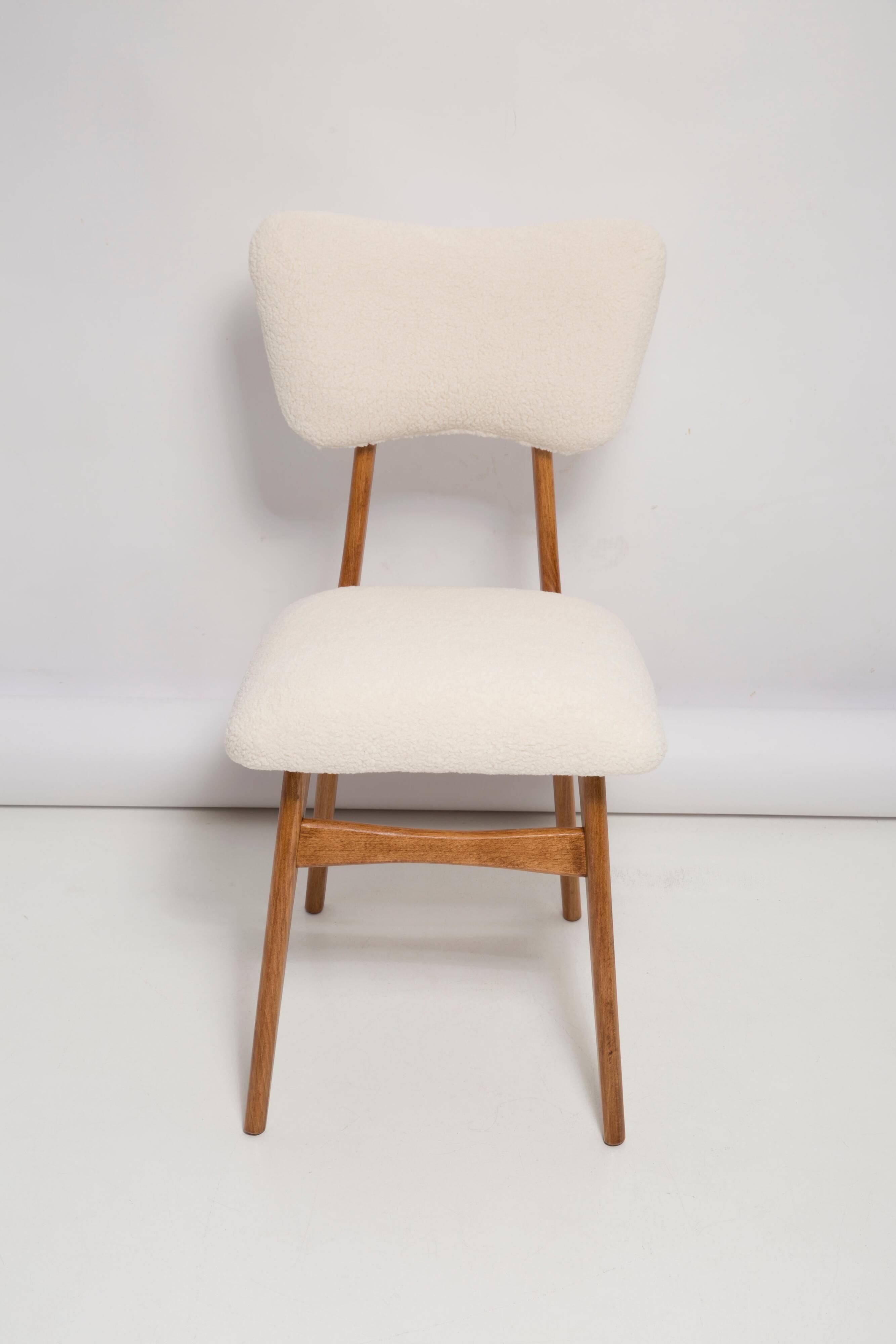 Butterfly chair in beech wood and cream boucle, Europe, 1960