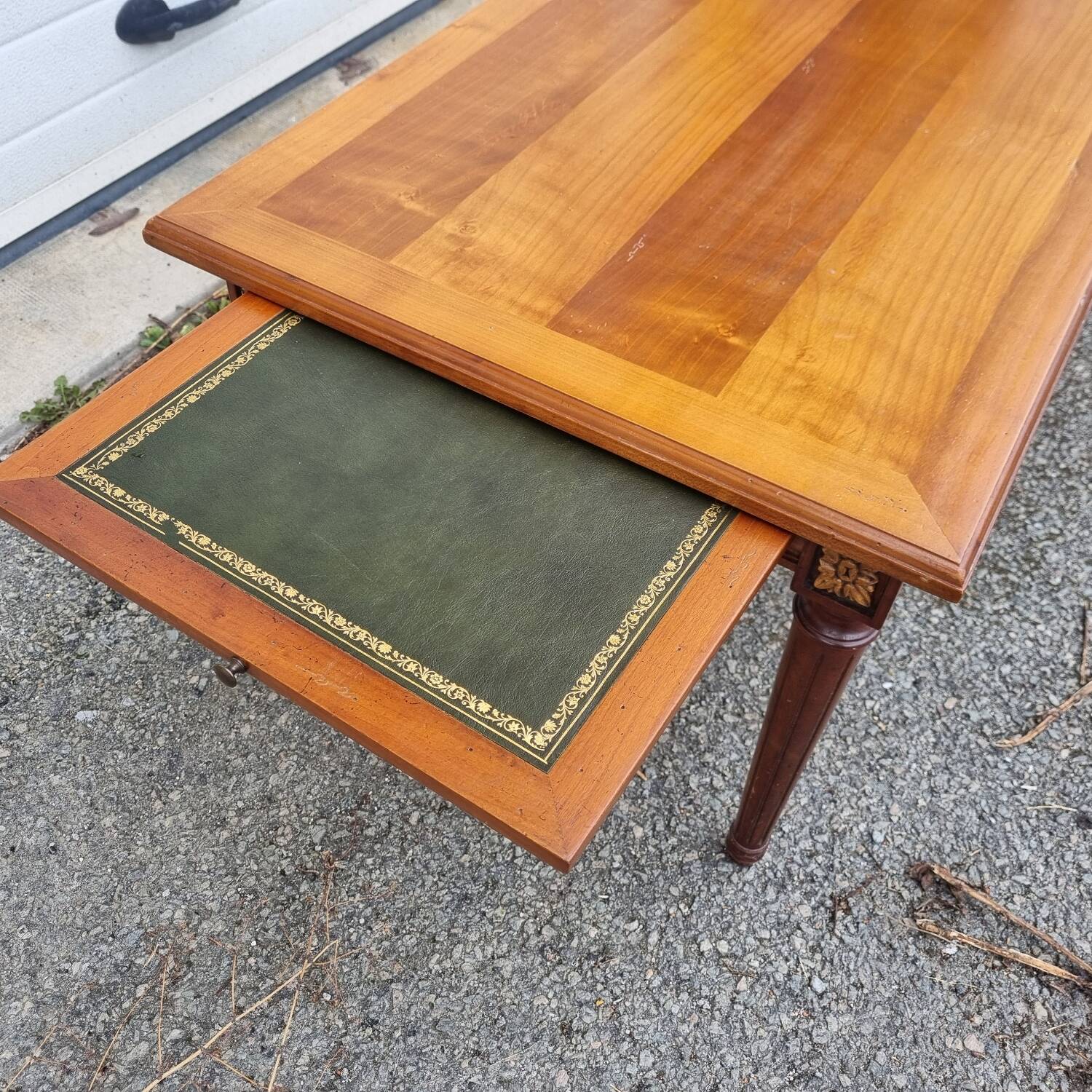 English wood coffee table with leather shelves