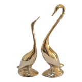Pair of stylized birds in solid brass