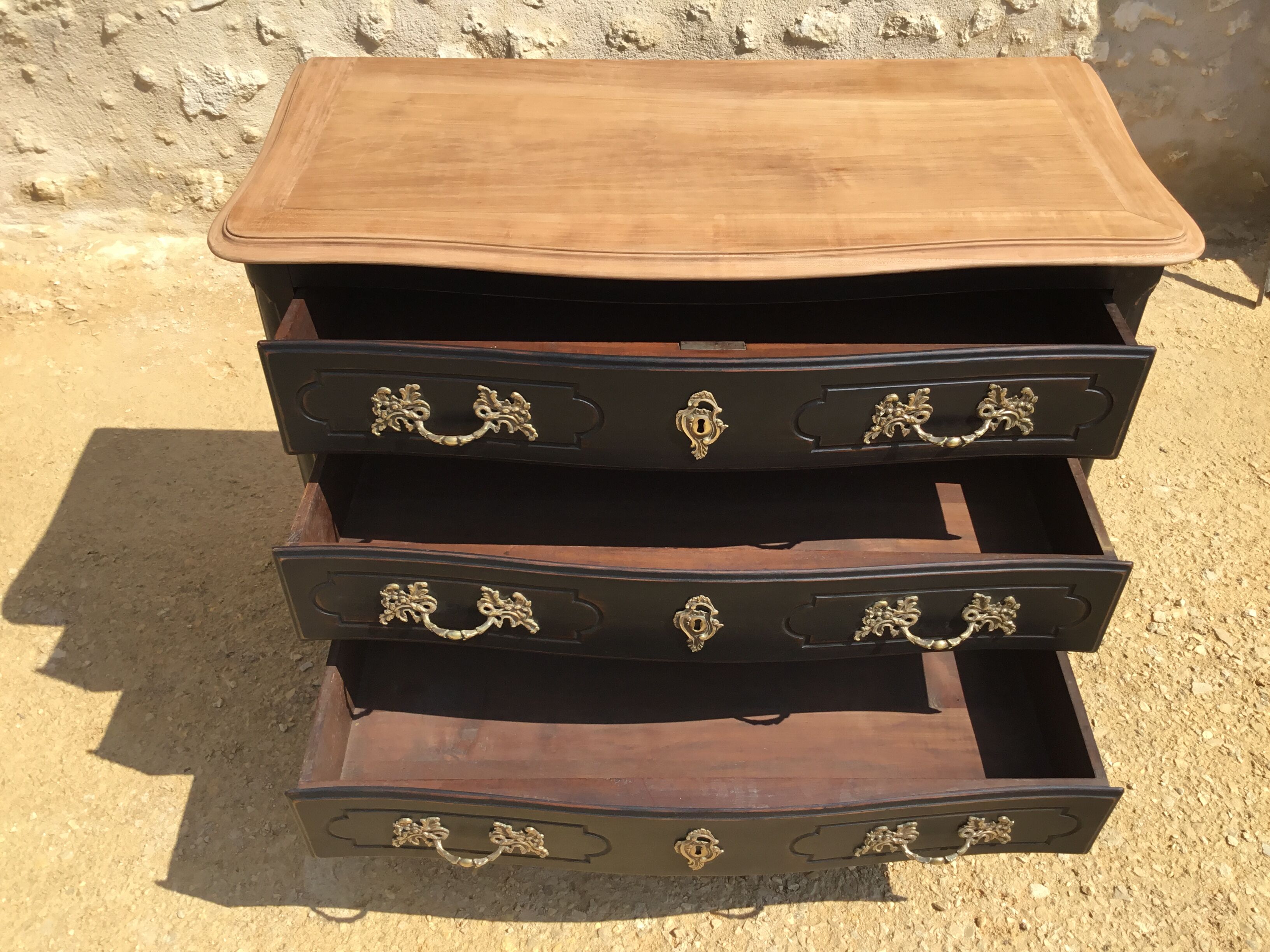 Louis XV style chest of drawers in cherry patinated in black top natural wood