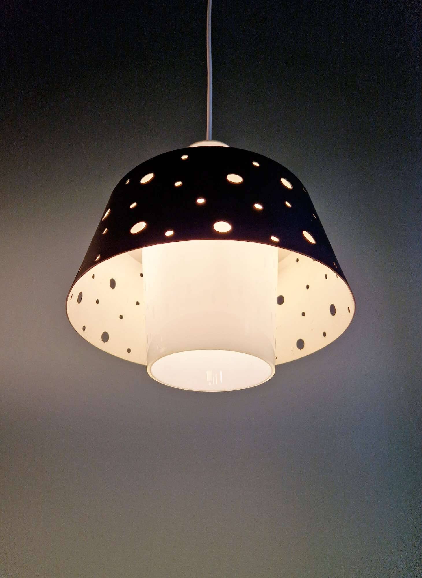 A pair of Scandinavian pendant lights in white opaline and black lacquered metal, 1960.