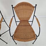 Pair of wicker and iron armchairs by Frederic Weinberg, United States, 1950s.