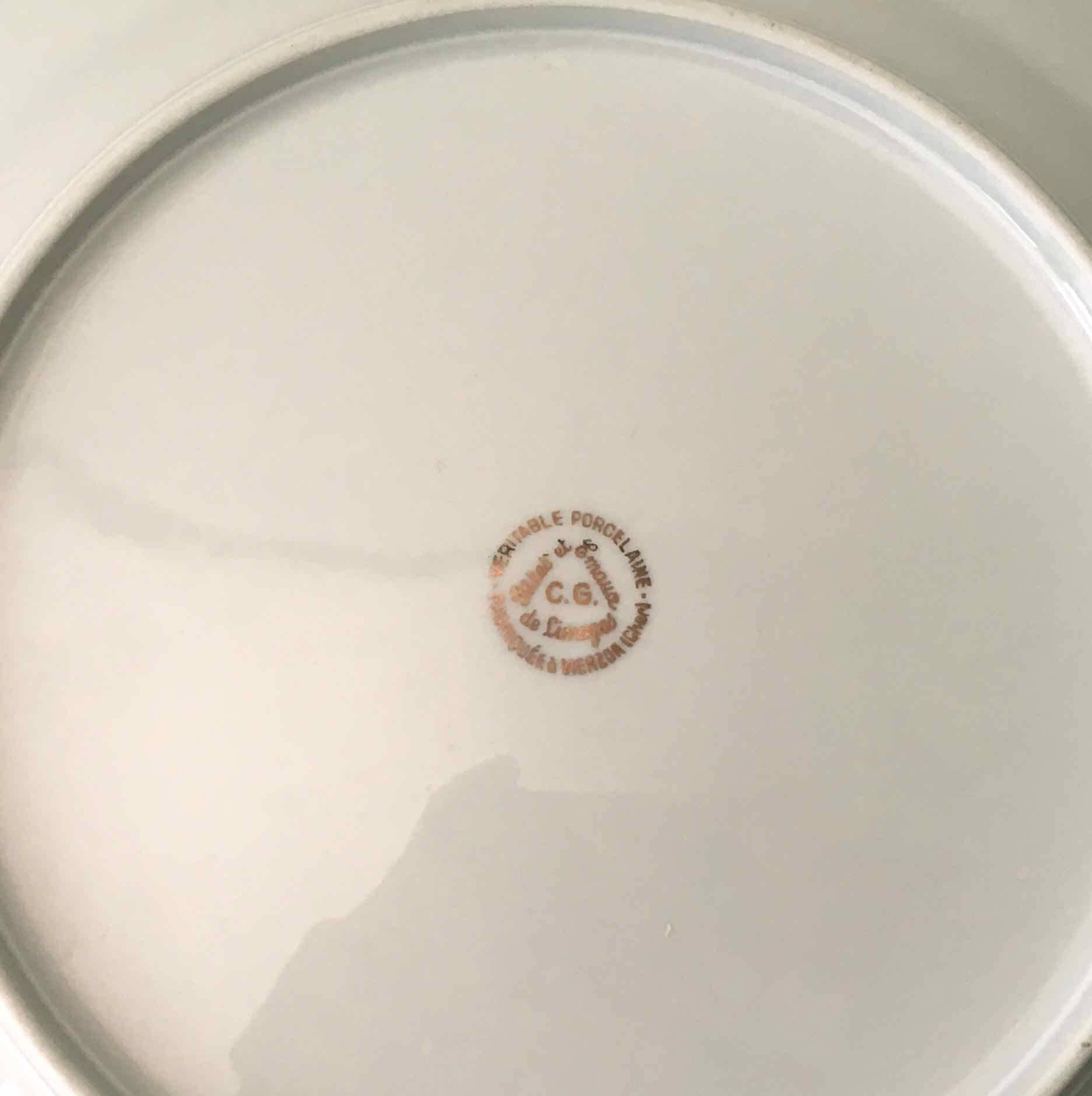 Set of 6 flowered porcelain dinner plates.